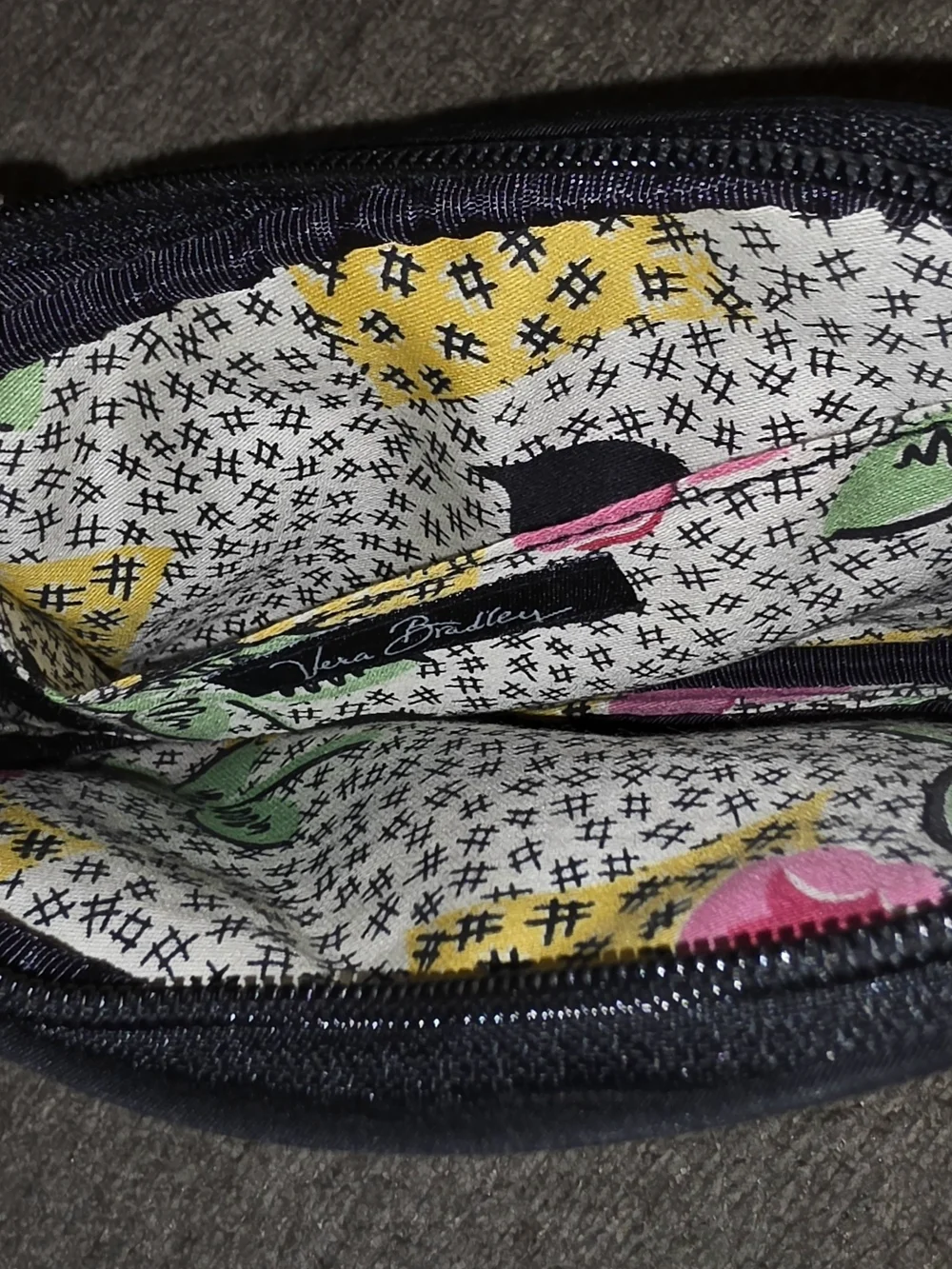 Vera Bradley's black quilted microfiber zip coin purse or small card wallet